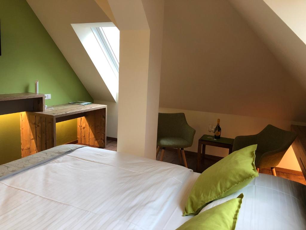 Postel nebo postele na pokoji v ubytování Hotel Braun