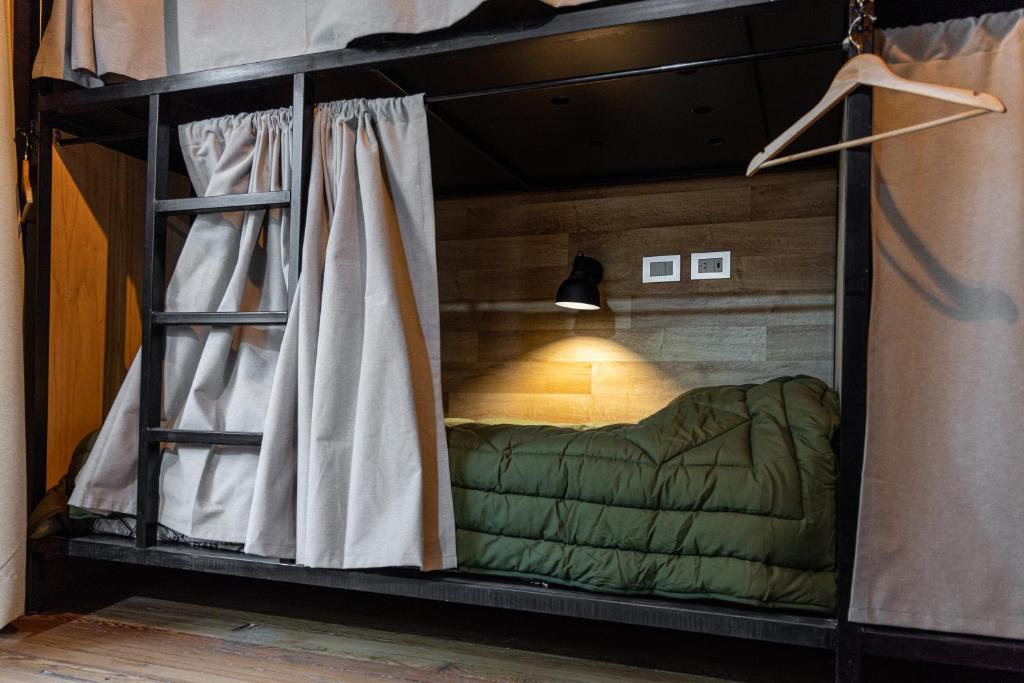 Postel nebo postele na pokoji v ubytování Che Juan Hostel BA