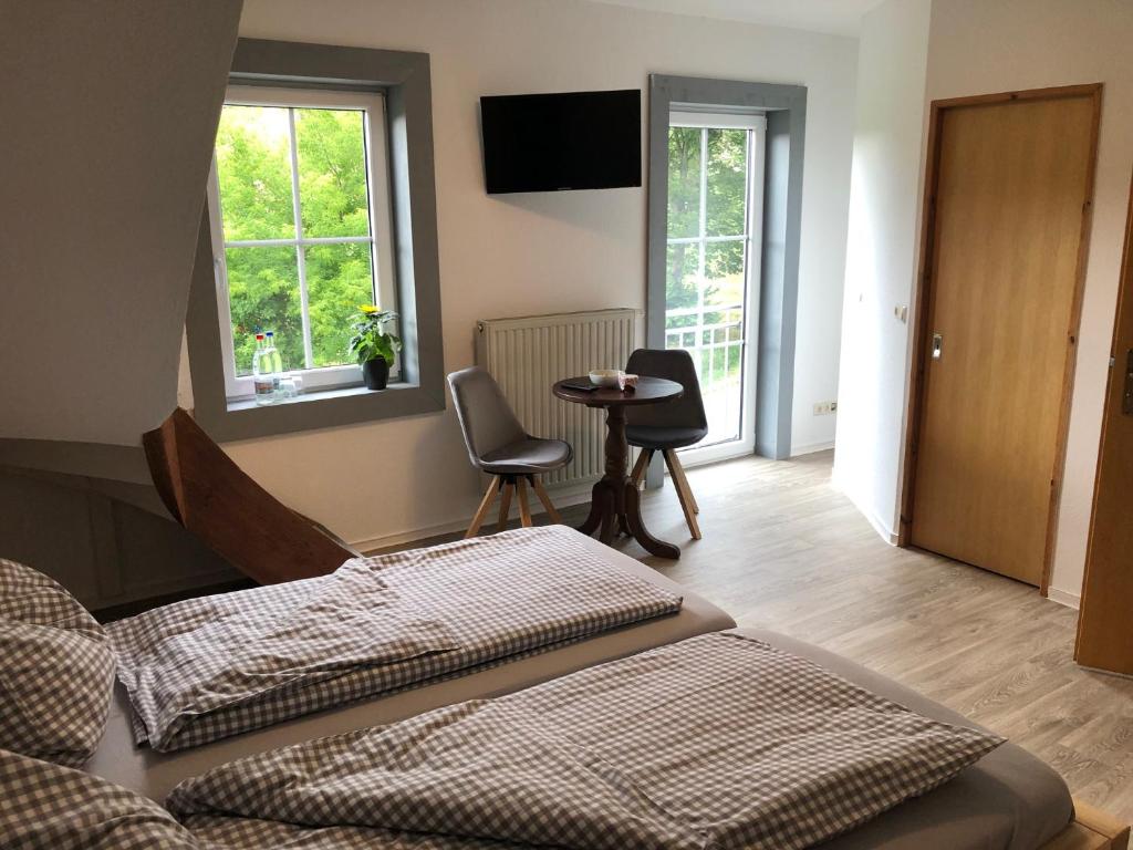 Postel nebo postele na pokoji v ubytování Landgasthof Wetteraperle