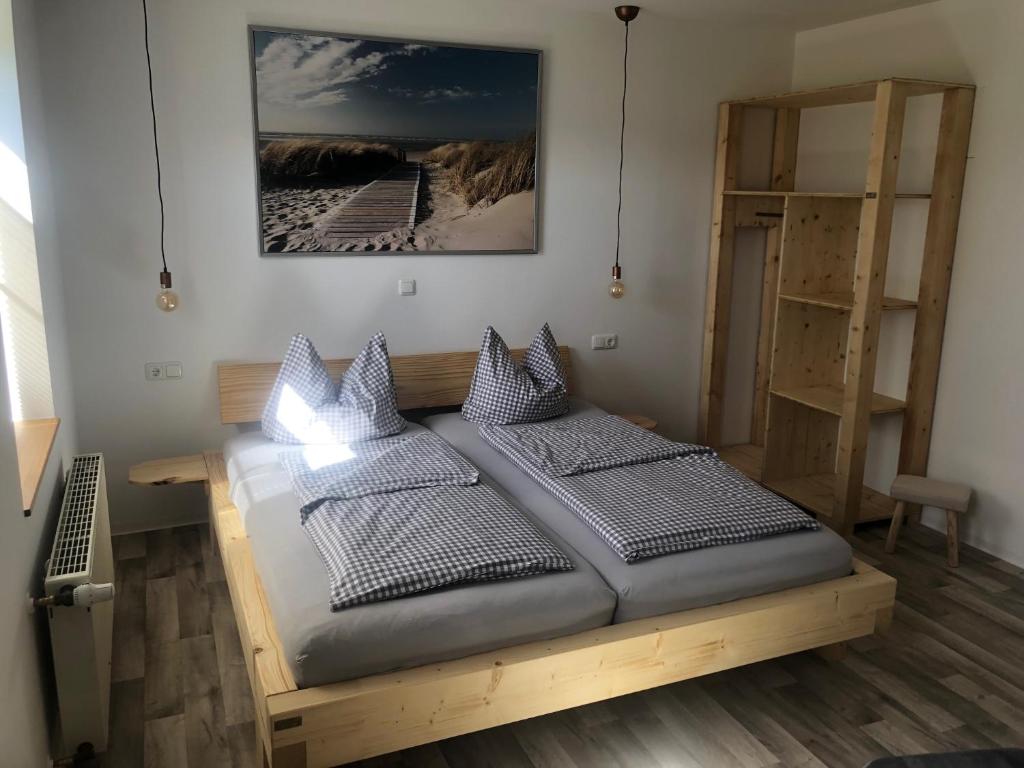 Postel nebo postele na pokoji v ubytování Landgasthof Wetteraperle