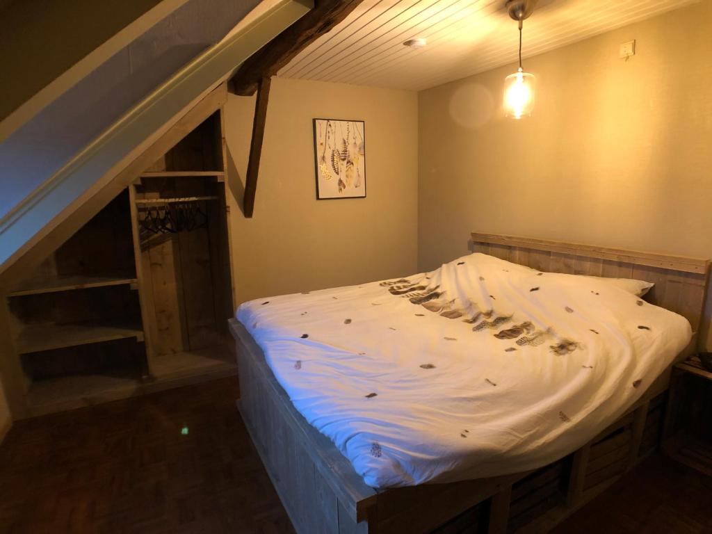 Postel nebo postele na pokoji v ubytování De Holsterhoeve