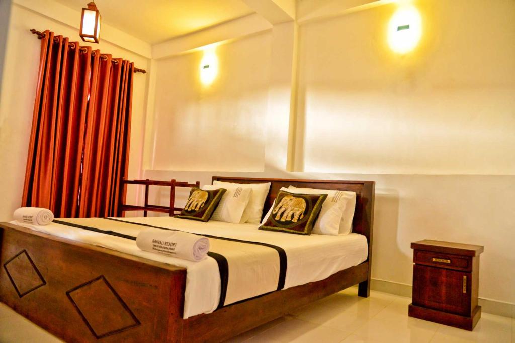 Postel nebo postele na pokoji v ubytování Ranweli Resort Anuradhapura