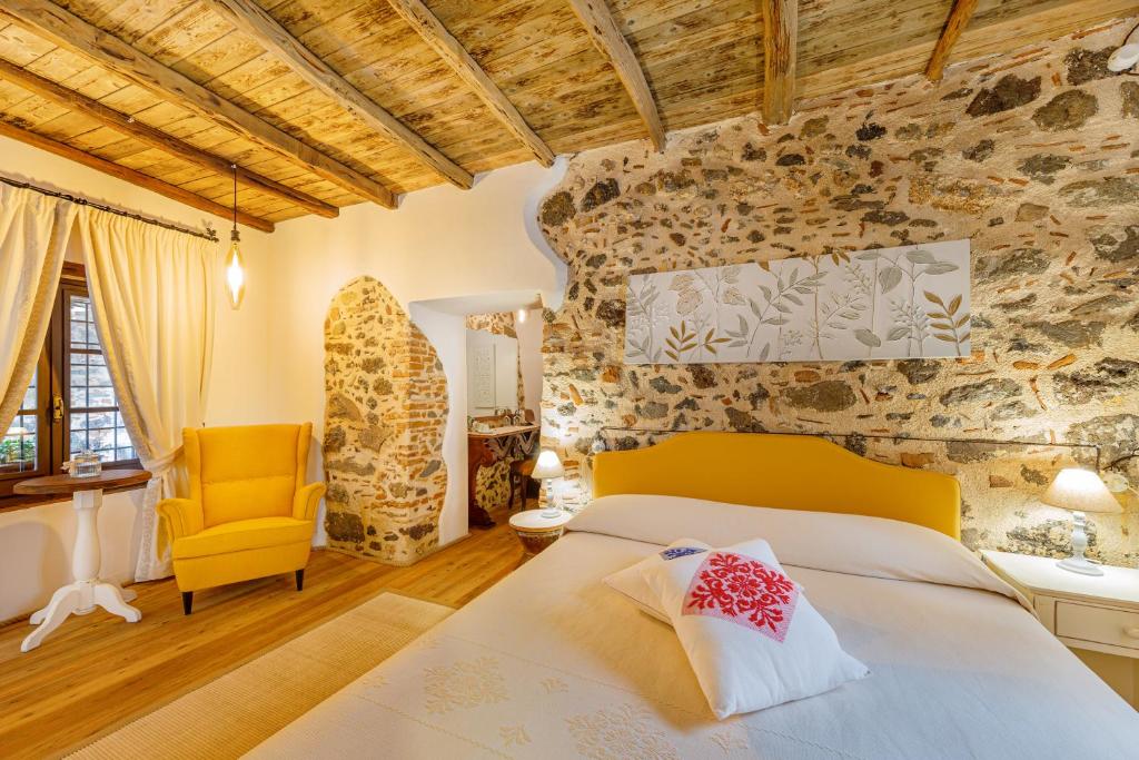 Voodi või voodid majutusasutuse Albergo Diffuso Mannois toas