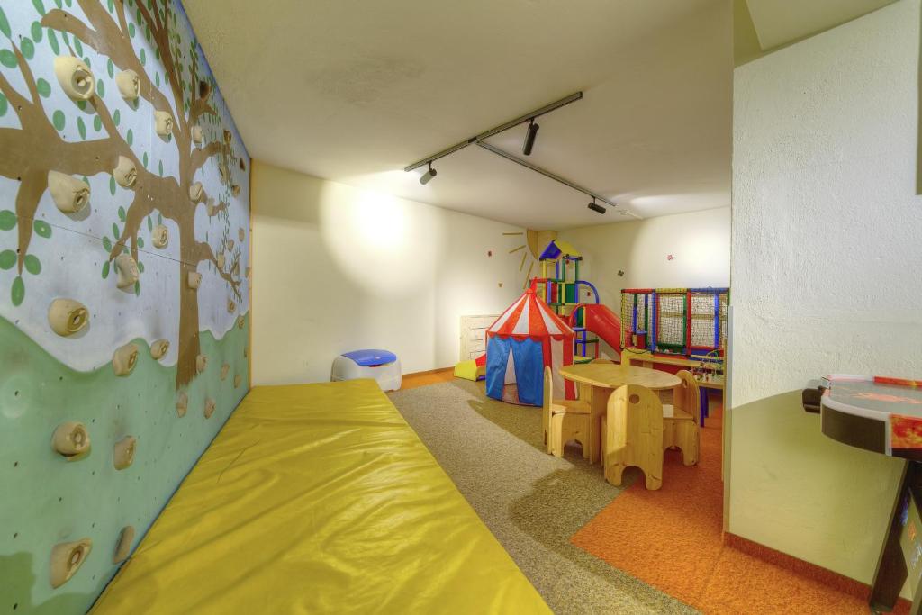 Dětský klub v ubytování Aparthotel Dorfplatzl Garni