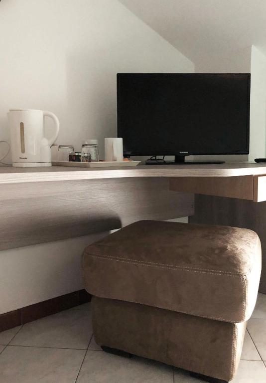 TV a/nebo společenská místnost v ubytování B&B "al Pesce Vela"
