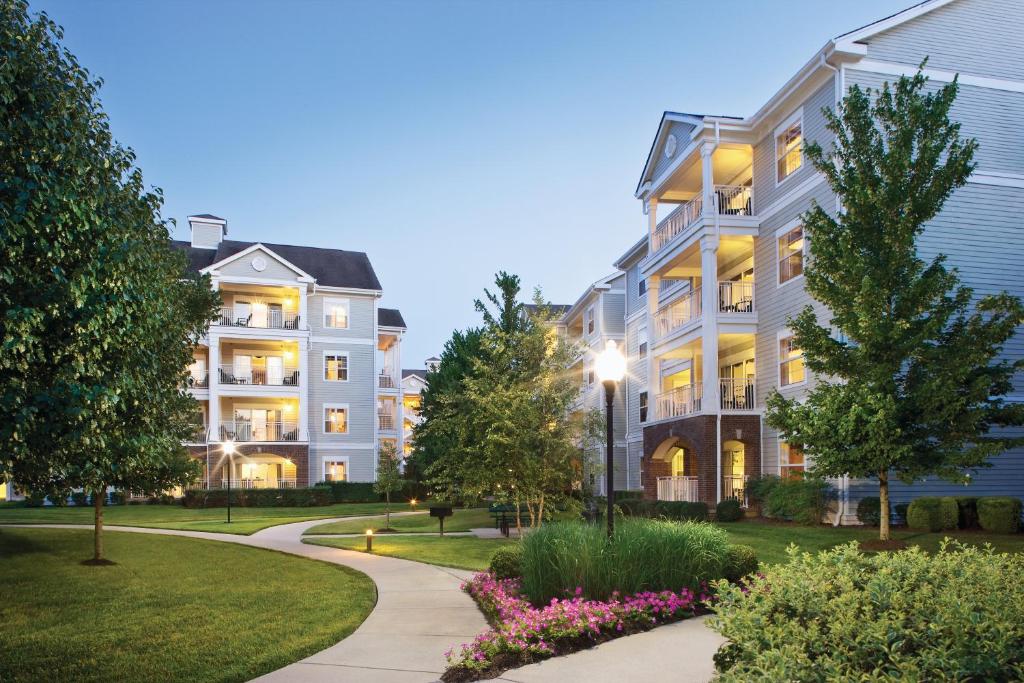 a rendering of a apartment building with a pathway at Club Wyndham Nashville in Nashville