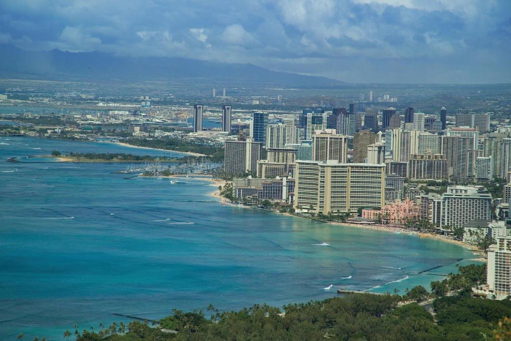 an aerial view of a city and a river at Waikiki Marina Resort at the Ilikai in Honolulu