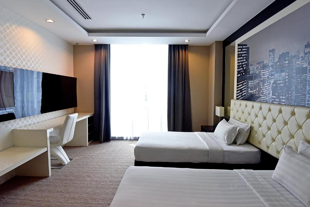 TV a/nebo společenská místnost v ubytování Jindagu Hotel Ipoh