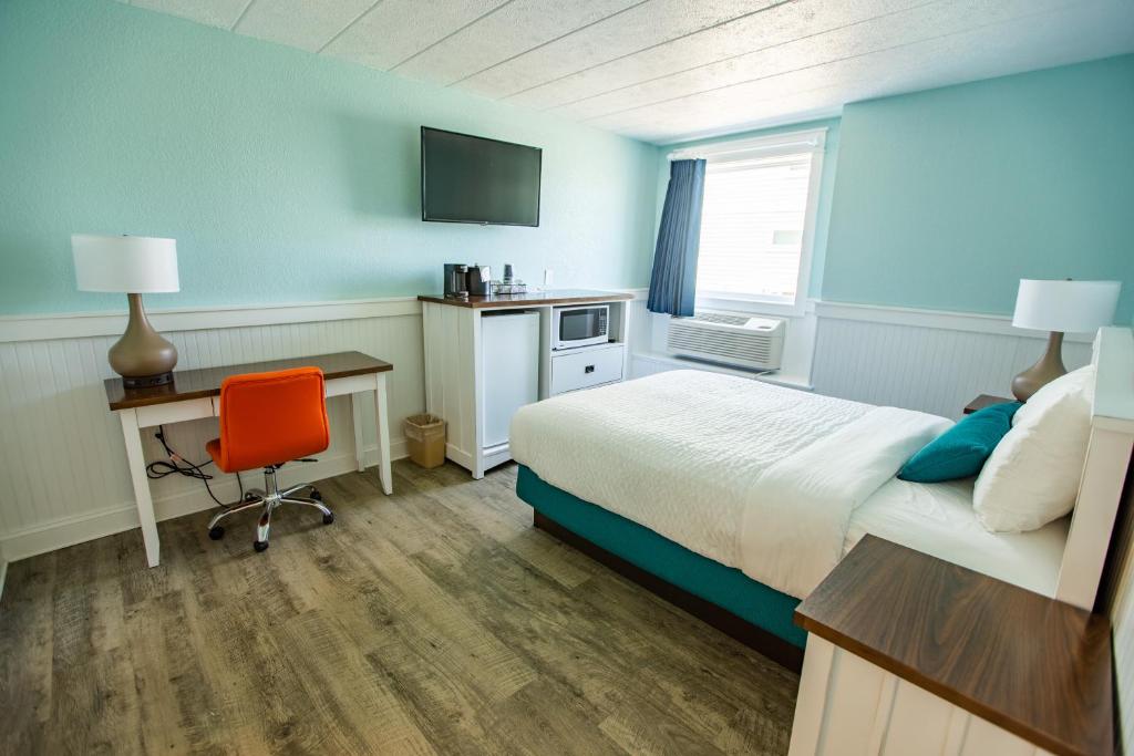 Cama o camas de una habitación en John Yancey Oceanfront Inn