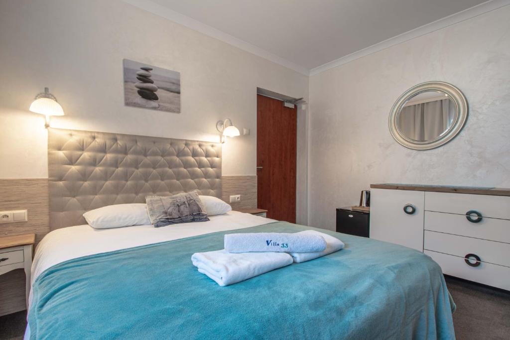 Posteľ alebo postele v izbe v ubytovaní Villa 33 Blisko Plaży