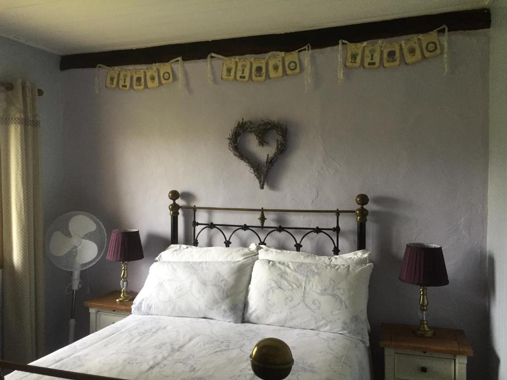 Postel nebo postele na pokoji v ubytování Michouat Chambre D'Hotes