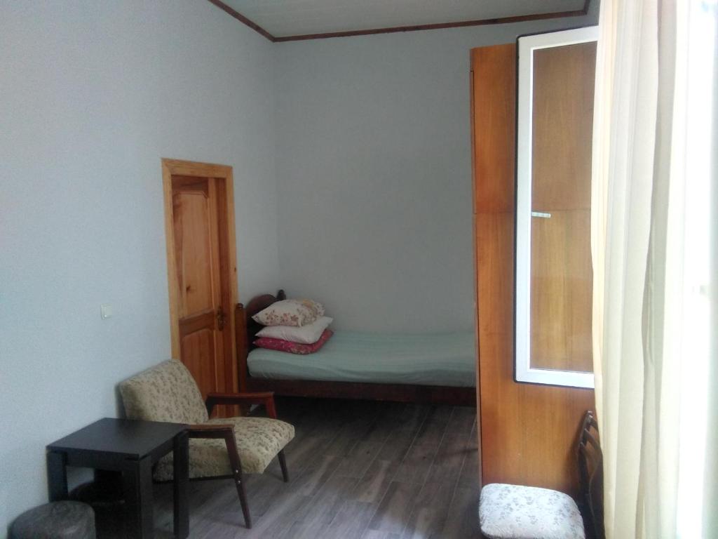 Postel nebo postele na pokoji v ubytování Str.Agmashenebeli 548