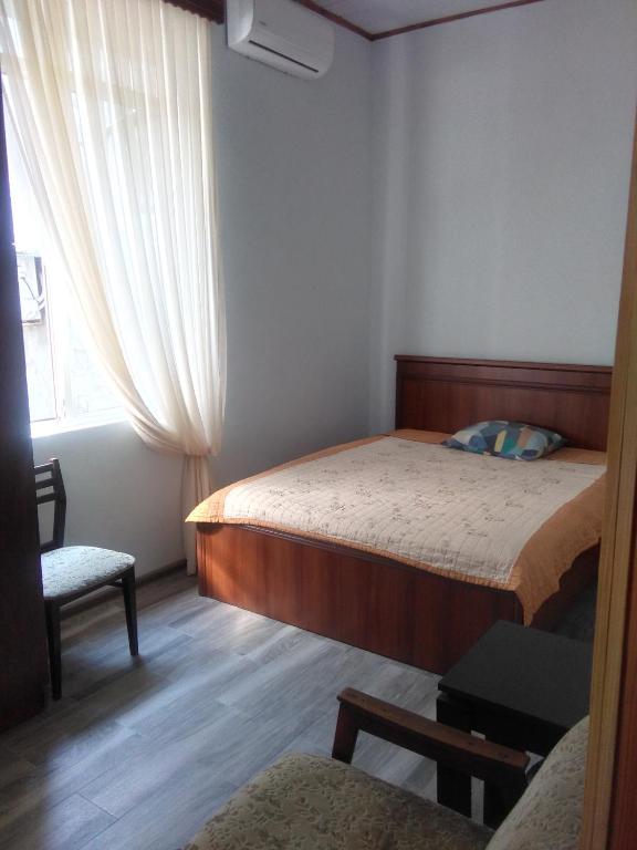 Postel nebo postele na pokoji v ubytování Str.Agmashenebeli 548