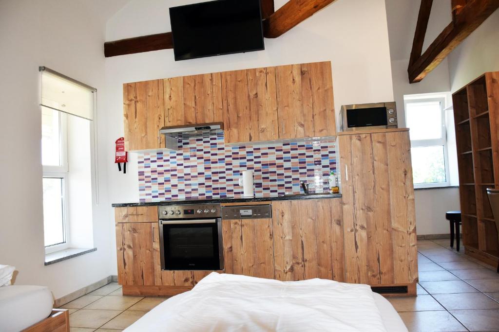 Kuchyň nebo kuchyňský kout v ubytování Apartment´s Marchtrenk