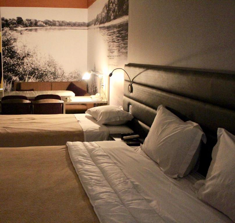 Cama o camas de una habitación en AGA Nortel