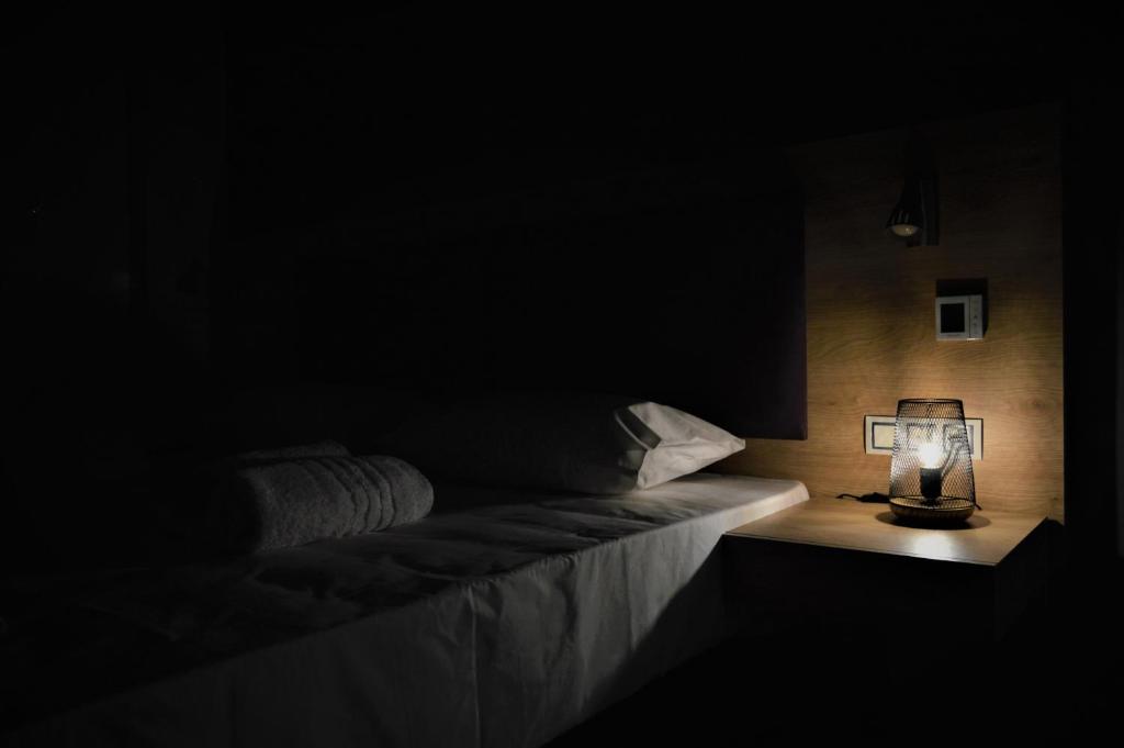Postel nebo postele na pokoji v ubytování Hotel Plaza