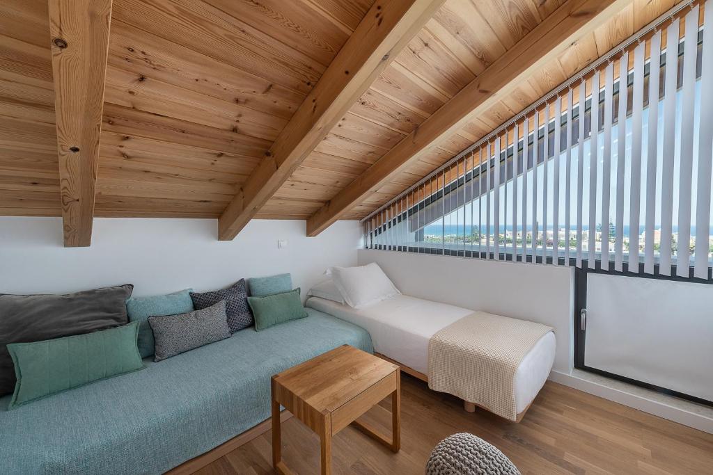 Posezení v ubytování Fos Villa, a Luxe House with Private Heated Pool