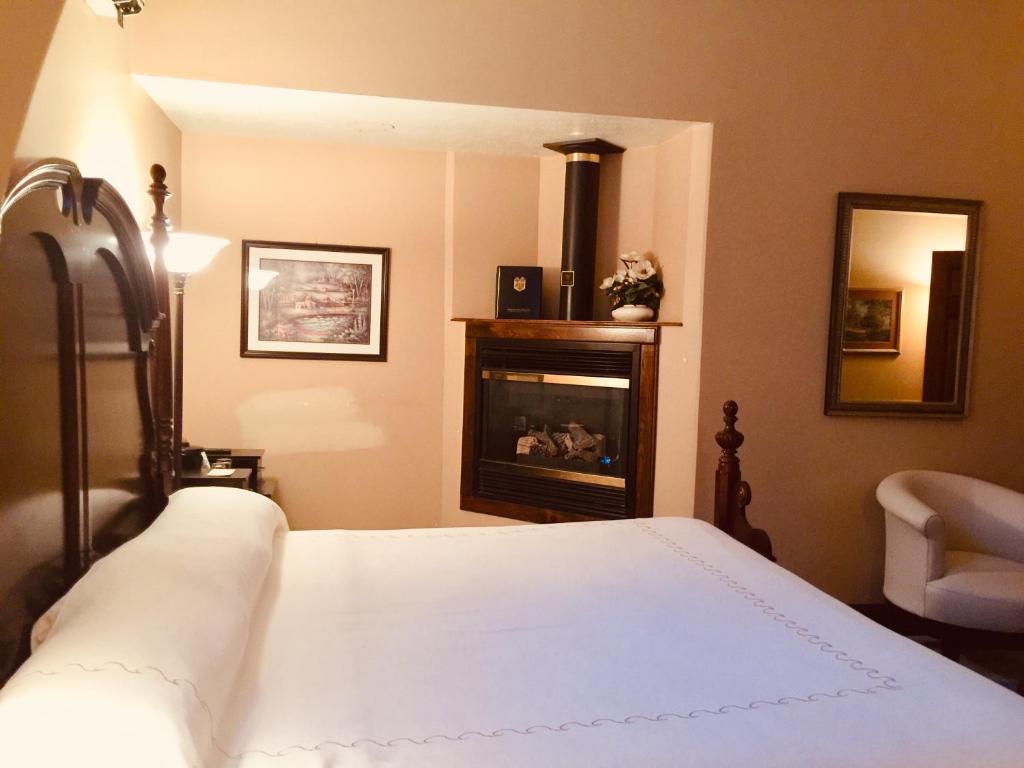Postel nebo postele na pokoji v ubytování Afton House Inn