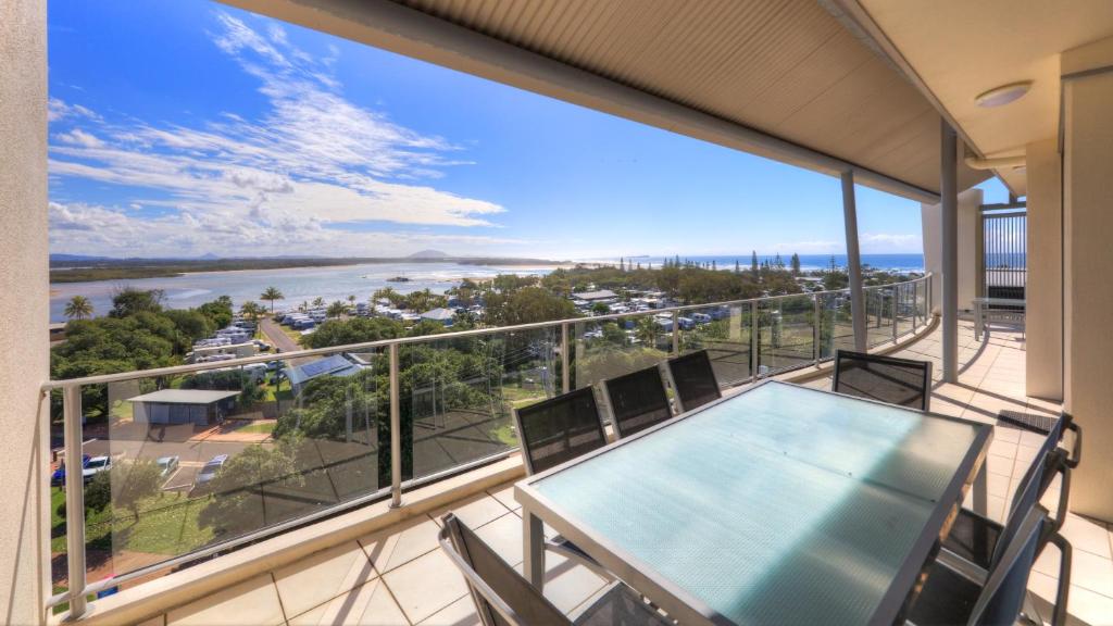 a view from the balcony of a large swimming pool at The Dunes Cotton Tree in Maroochydore