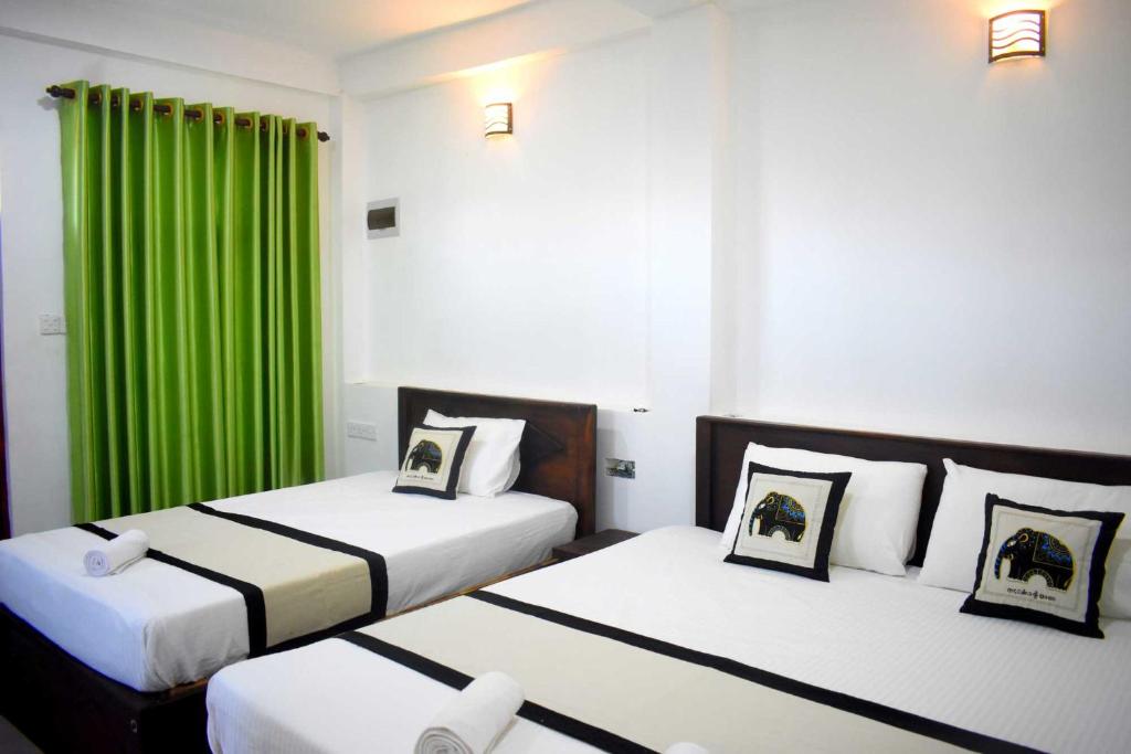 Postel nebo postele na pokoji v ubytování Ranweli Resort Anuradhapura