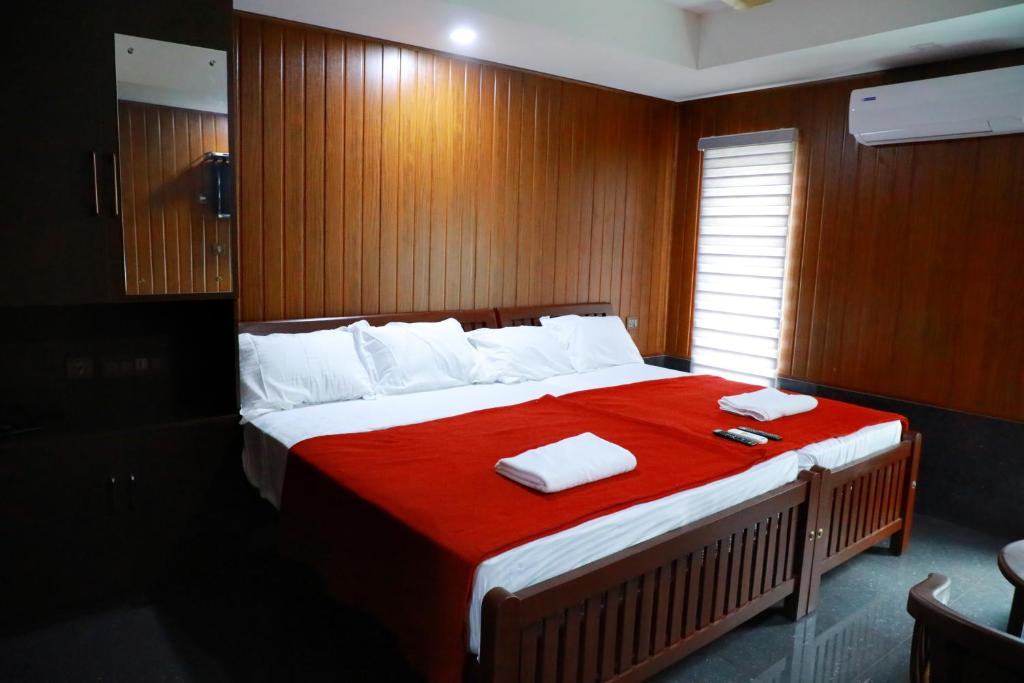 Ashoka Inn Chottanikkara - Luxe Drievoudige Kamer