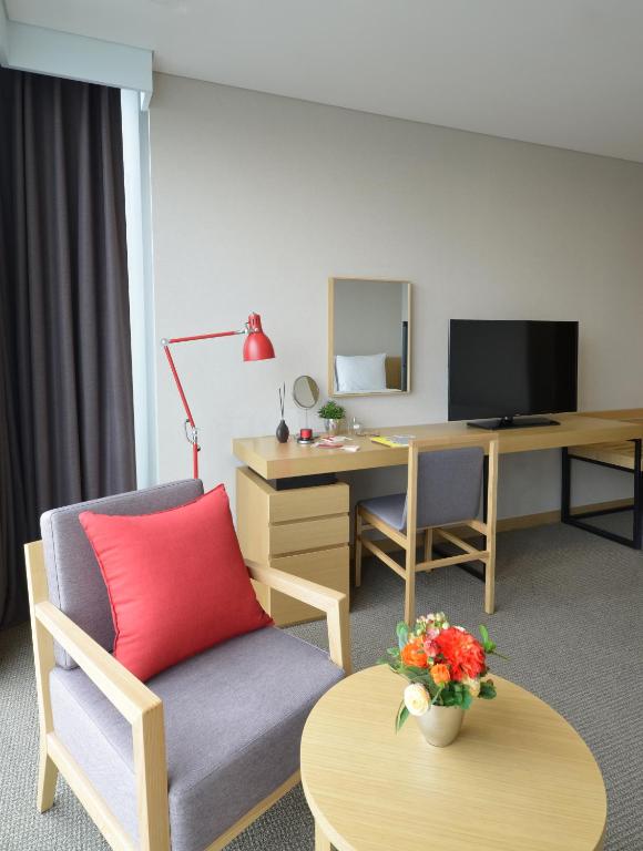 TV a/nebo společenská místnost v ubytování Harbor Park Hotel