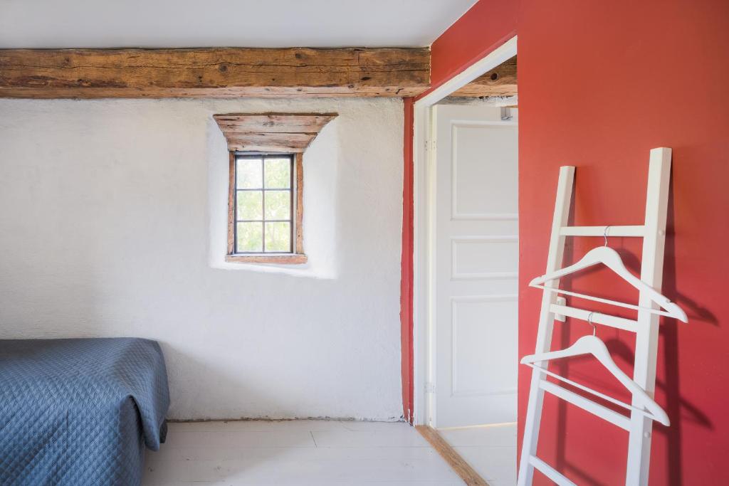 Postel nebo postele na pokoji v ubytování Liste Gård