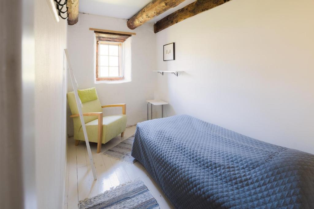 Postel nebo postele na pokoji v ubytování Liste Gård