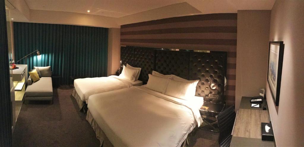 Postel nebo postele na pokoji v ubytování Starhaus Hotel