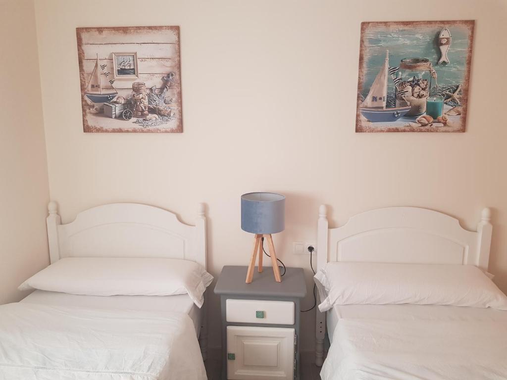 Postel nebo postele na pokoji v ubytování Casa del Sol