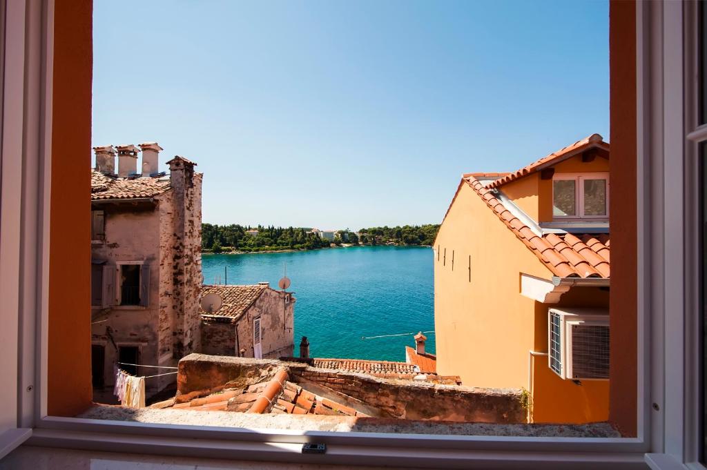 a view of a river from a window at Casa Colloredo Free Parking in Rovinj