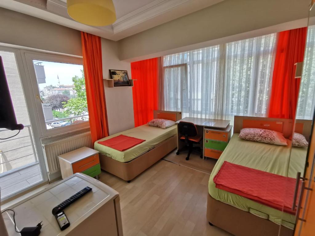 Postel nebo postele na pokoji v ubytování Çanakkale Kampüs Pansiyon