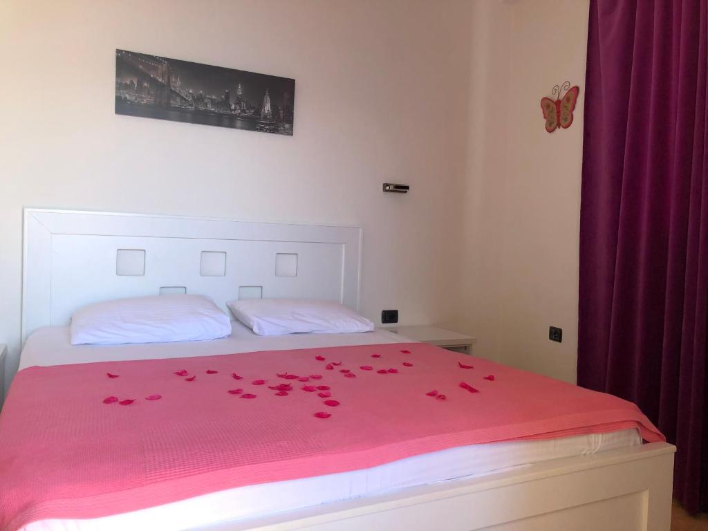 Postel nebo postele na pokoji v ubytování Envi Hotel