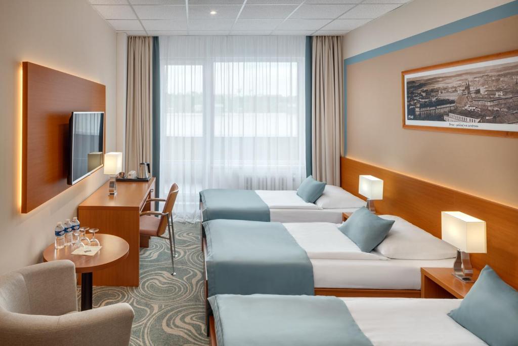 TV a/nebo společenská místnost v ubytování Avanti Hotel