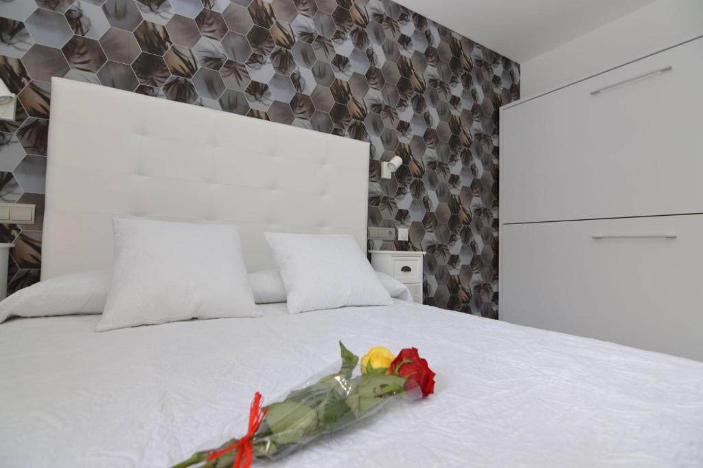Postel nebo postele na pokoji v ubytování Hotel Castillo Benidorm