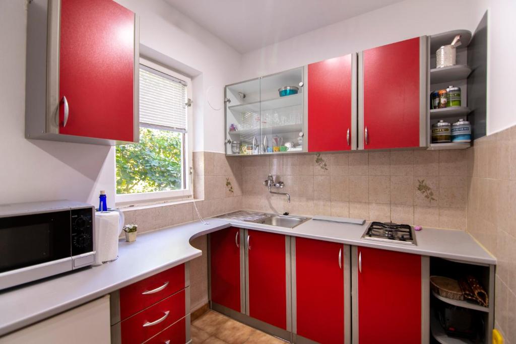 Kuchyň nebo kuchyňský kout v ubytování Apartments Mare