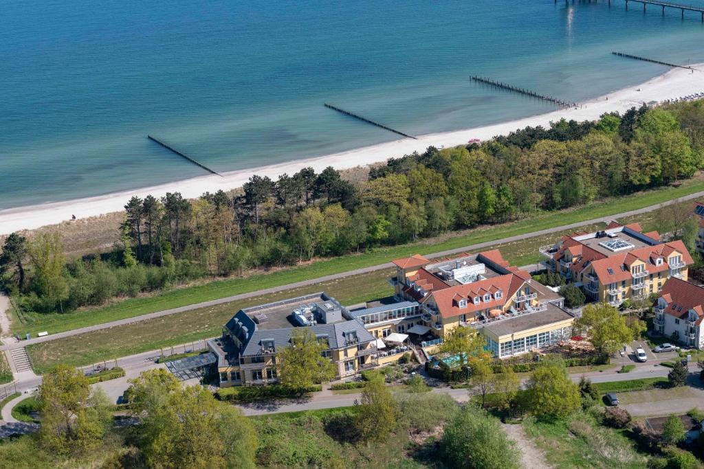 an aerial view of a house next to the beach at Hotel Meerlust in Zingst