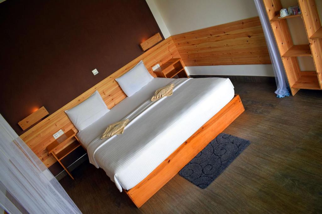 Postel nebo postele na pokoji v ubytování The Chillout Ella