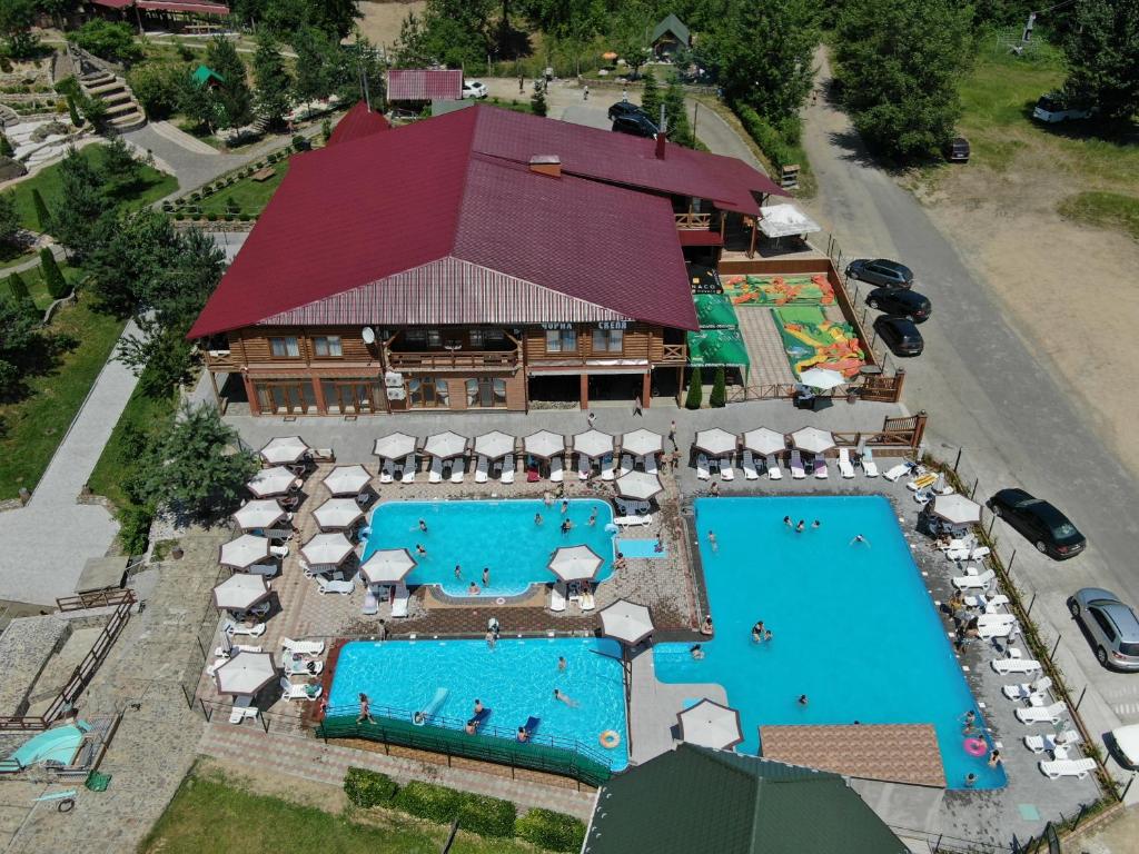 an overhead view of a resort with two swimming pools at Chorna Skelya Resort & Wellness in Vynohradiv