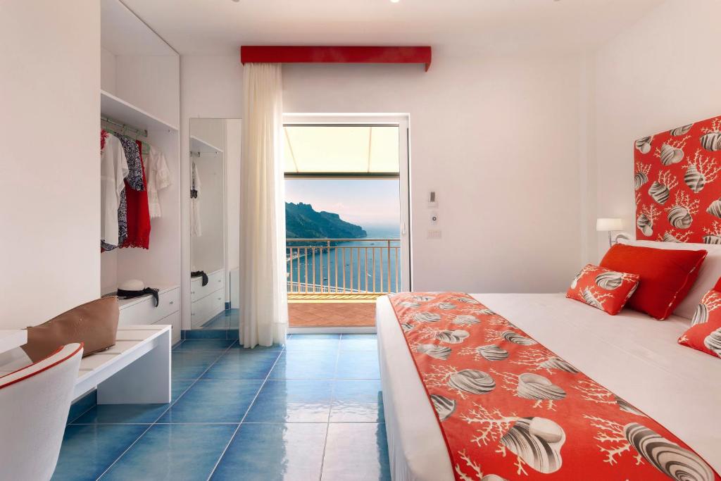Postel nebo postele na pokoji v ubytování Gala Residence Villa Giovanna