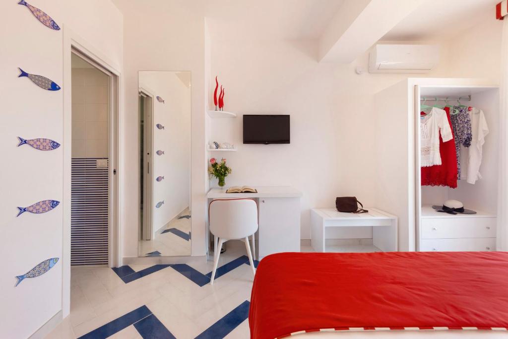 Postel nebo postele na pokoji v ubytování Gala Residence Villa Giovanna