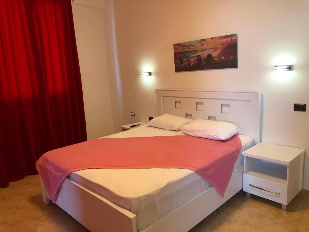 Postel nebo postele na pokoji v ubytování Envi Hotel