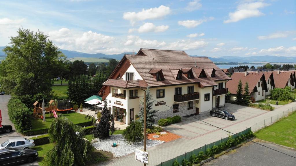 an overhead view of a house with a roof at Penzion Ravence in Liptovský Trnovec