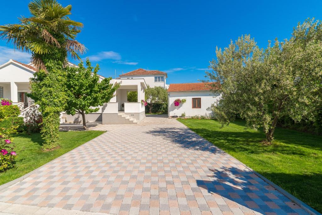 Vonkajšia záhrada v ubytovaní Apartments Coronata