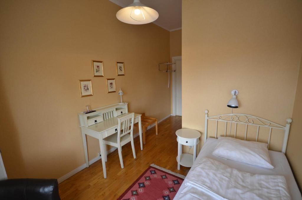 Postel nebo postele na pokoji v ubytování Hotell Royal