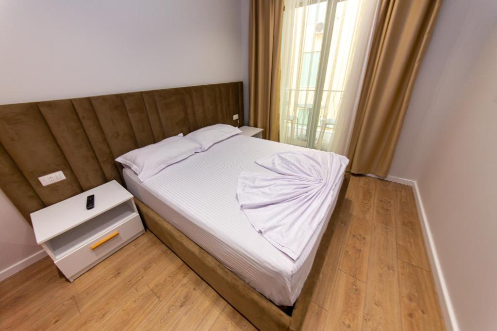 Postel nebo postele na pokoji v ubytování Hotel Alion