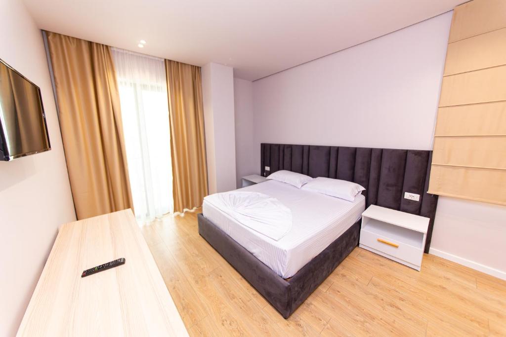 Postel nebo postele na pokoji v ubytování Hotel Alion