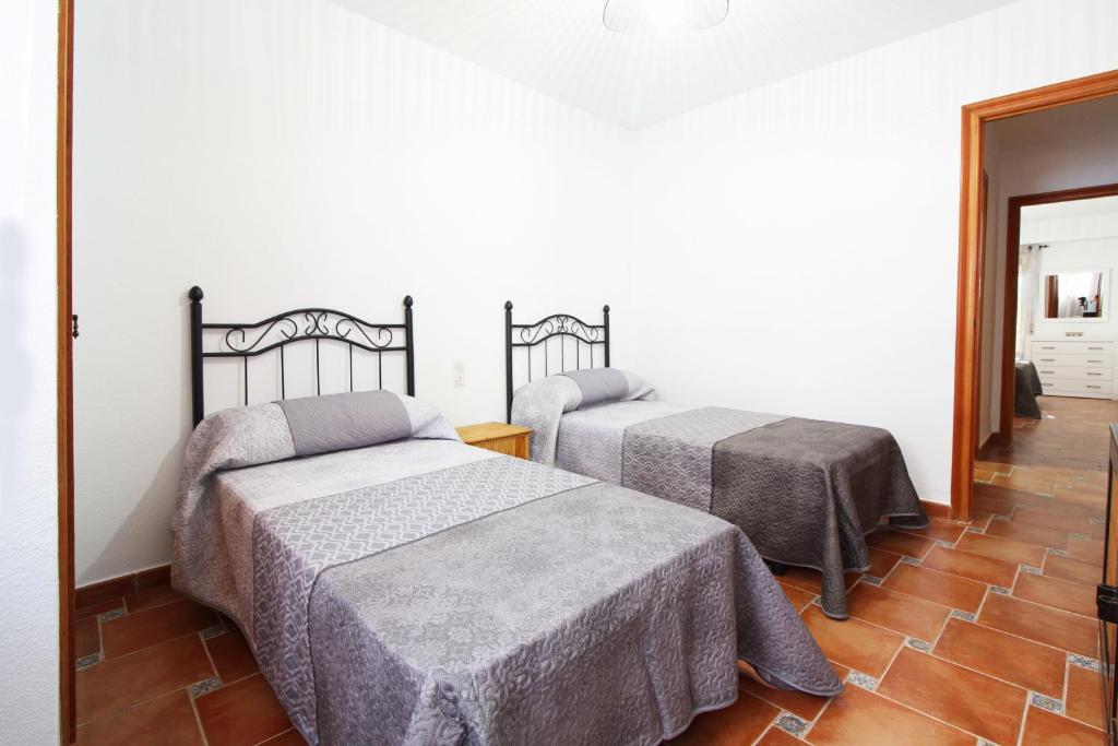 Posteľ alebo postele v izbe v ubytovaní Global Properties, El Coquetón - Bonito y tranquilo apartamento en Canet playa