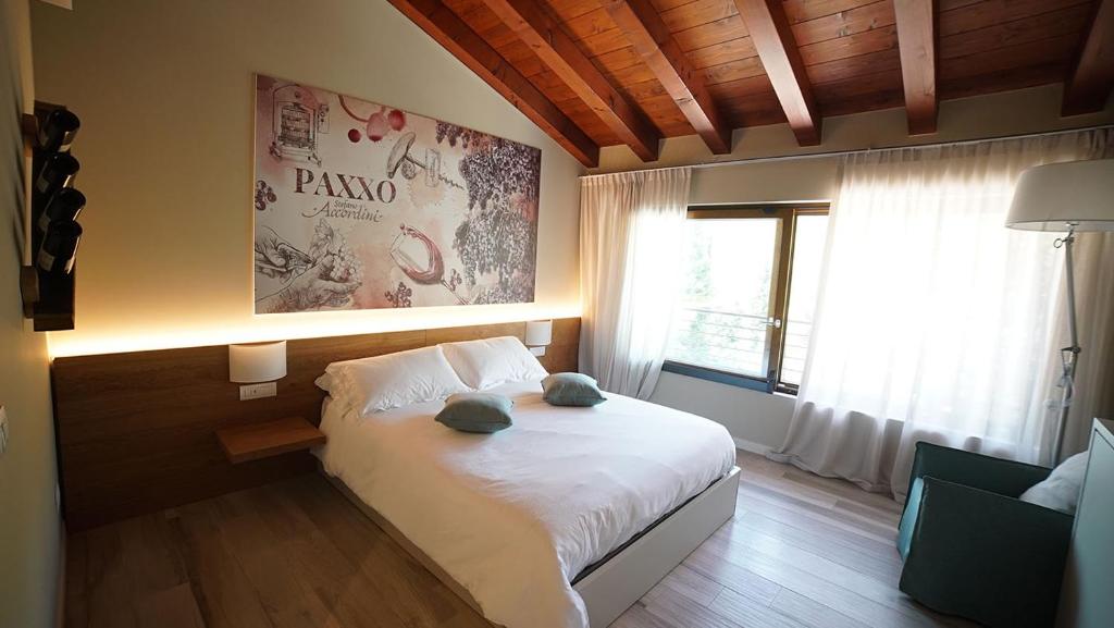 Postel nebo postele na pokoji v ubytování AGRITURISMO ACINATICO WINE RELAIS