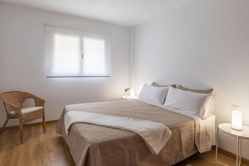 Postel nebo postele na pokoji v ubytování Apartamento La Nuit con Parking gratis en centro histórico